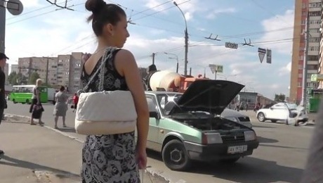 Outdoor scene with a young girl in sexy dress