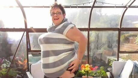 An old lady with saggy boobs Honey fucks with her lovely sex toy